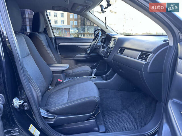 Черный Мицубиси Аутлендер, объемом двигателя 2.36 л и пробегом 150 тыс. км за 14900 $, фото 44 на Automoto.ua