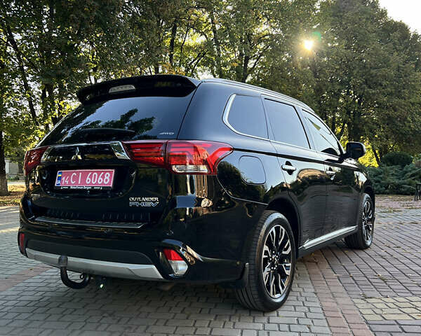 Чорний Міцубісі Аутлендер, об'ємом двигуна 2 л та пробігом 233 тис. км за 18000 $, фото 19 на Automoto.ua