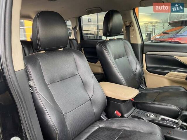 Черный Мицубиси Аутлендер, объемом двигателя 2.36 л и пробегом 143 тыс. км за 12900 $, фото 24 на Automoto.ua