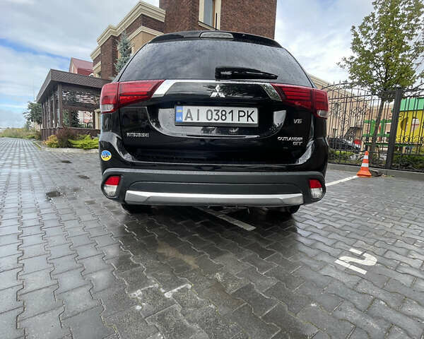 Черный Мицубиси Аутлендер, объемом двигателя 3 л и пробегом 257 тыс. км за 13699 $, фото 11 на Automoto.ua