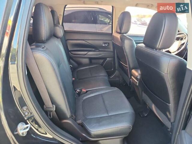 Чорний Міцубісі Аутлендер, об'ємом двигуна 2.36 л та пробігом 99 тис. км за 2100 $, фото 9 на Automoto.ua