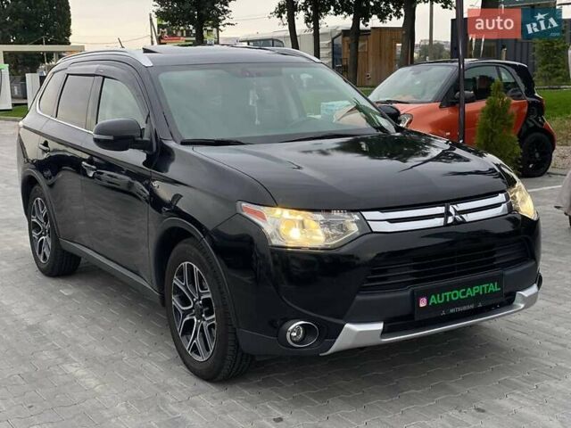 Черный Мицубиси Аутлендер, объемом двигателя 3 л и пробегом 146 тыс. км за 15990 $, фото 4 на Automoto.ua