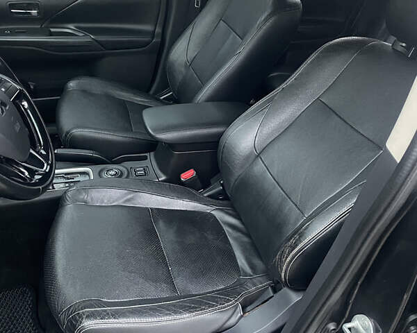 Черный Мицубиси Аутлендер, объемом двигателя 3 л и пробегом 260 тыс. км за 13799 $, фото 21 на Automoto.ua