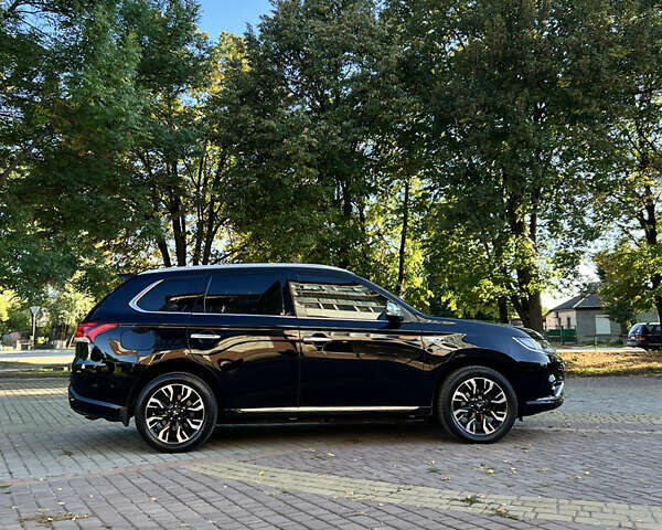 Чорний Міцубісі Аутлендер, об'ємом двигуна 2 л та пробігом 233 тис. км за 18000 $, фото 18 на Automoto.ua