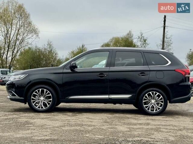 Чорний Міцубісі Аутлендер, об'ємом двигуна 2.2 л та пробігом 188 тис. км за 16999 $, фото 13 на Automoto.ua