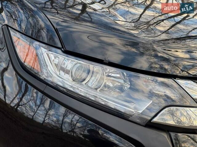 Черный Мицубиси Аутлендер, объемом двигателя 3 л и пробегом 99 тыс. км за 15800 $, фото 6 на Automoto.ua