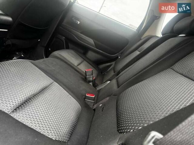 Черный Мицубиси Аутлендер, объемом двигателя 3 л и пробегом 99 тыс. км за 15980 $, фото 26 на Automoto.ua