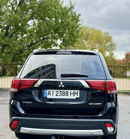 Чорний Міцубісі Аутлендер, об'ємом двигуна 2.36 л та пробігом 154 тис. км за 19500 $, фото 28 на Automoto.ua