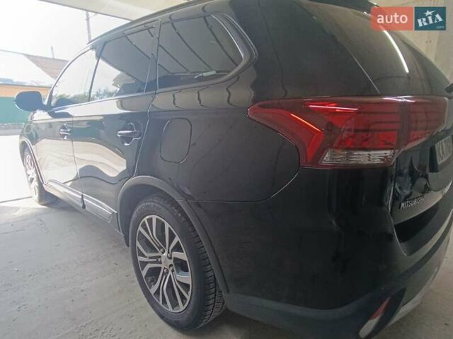 Черный Мицубиси Аутлендер, объемом двигателя 2.36 л и пробегом 120 тыс. км за 16900 $, фото 18 на Automoto.ua