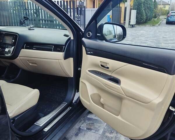 Чорний Міцубісі Аутлендер, об'ємом двигуна 2.36 л та пробігом 213 тис. км за 14500 $, фото 19 на Automoto.ua