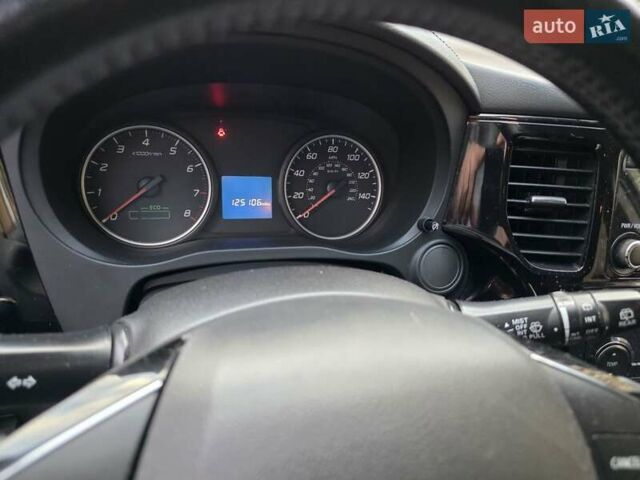 Черный Мицубиси Аутлендер, объемом двигателя 2.4 л и пробегом 195 тыс. км за 13953 $, фото 1 на Automoto.ua