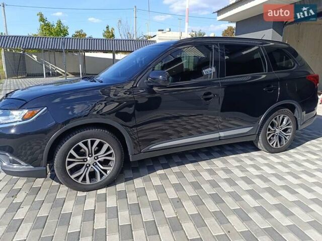 Черный Мицубиси Аутлендер, объемом двигателя 2.36 л и пробегом 120 тыс. км за 16900 $, фото 8 на Automoto.ua