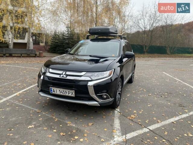 Чорний Міцубісі Аутлендер, об'ємом двигуна 2.36 л та пробігом 192 тис. км за 14200 $, фото 11 на Automoto.ua