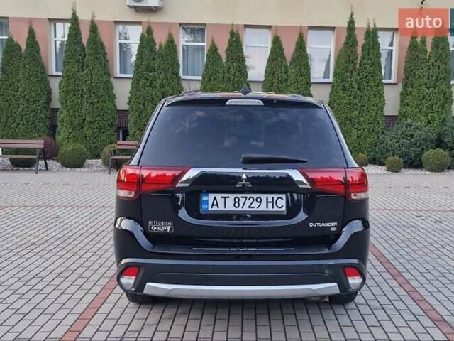 Черный Мицубиси Аутлендер, объемом двигателя 2.36 л и пробегом 168 тыс. км за 14999 $, фото 5 на Automoto.ua