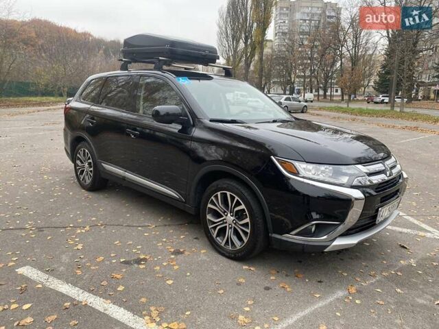 Чорний Міцубісі Аутлендер, об'ємом двигуна 2.36 л та пробігом 192 тис. км за 14200 $, фото 8 на Automoto.ua