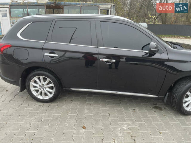 Чорний Міцубісі Аутлендер, об'ємом двигуна 2 л та пробігом 145 тис. км за 21200 $, фото 17 на Automoto.ua