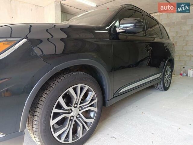 Черный Мицубиси Аутлендер, объемом двигателя 2.36 л и пробегом 120 тыс. км за 16900 $, фото 17 на Automoto.ua
