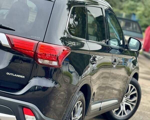 Чорний Міцубісі Аутлендер, об'ємом двигуна 2.2 л та пробігом 188 тис. км за 16999 $, фото 15 на Automoto.ua