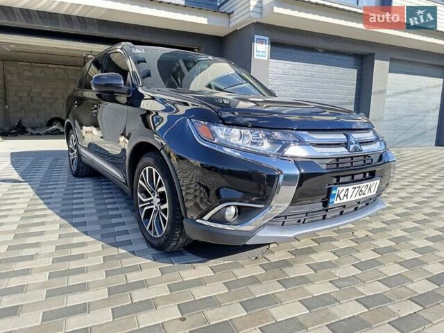 Черный Мицубиси Аутлендер, объемом двигателя 2.36 л и пробегом 120 тыс. км за 16900 $, фото 4 на Automoto.ua