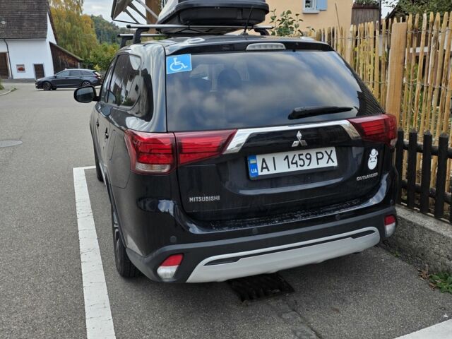 Чорний Міцубісі Аутлендер, об'ємом двигуна 2.4 л та пробігом 195 тис. км за 15138 $, фото 7 на Automoto.ua