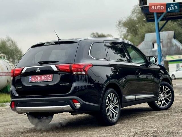 Чорний Міцубісі Аутлендер, об'ємом двигуна 2.2 л та пробігом 188 тис. км за 16999 $, фото 12 на Automoto.ua