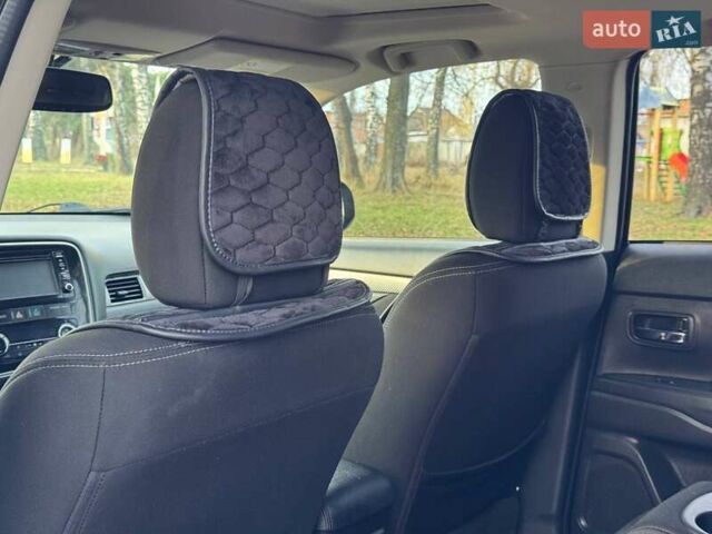 Черный Мицубиси Аутлендер, объемом двигателя 3 л и пробегом 99 тыс. км за 15800 $, фото 29 на Automoto.ua