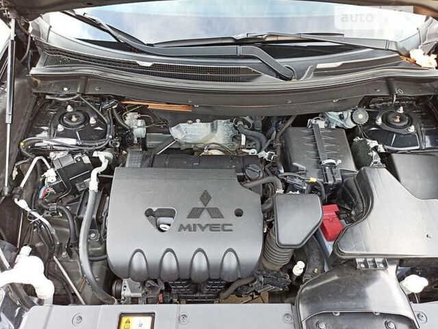 Чорний Міцубісі Аутлендер, об'ємом двигуна 2.4 л та пробігом 171 тис. км за 14900 $, фото 28 на Automoto.ua