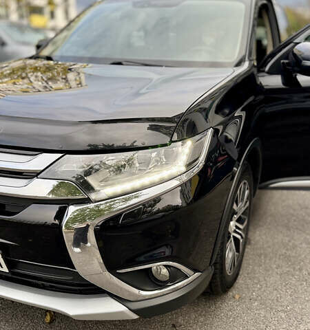 Чорний Міцубісі Аутлендер, об'ємом двигуна 2.36 л та пробігом 154 тис. км за 19500 $, фото 4 на Automoto.ua