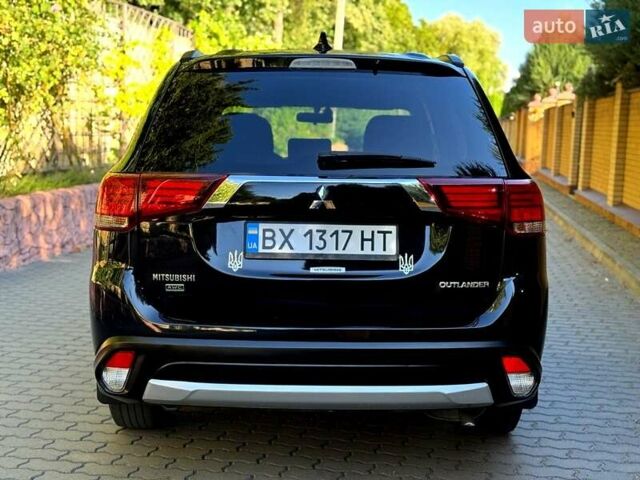 Чорний Міцубісі Аутлендер, об'ємом двигуна 2.36 л та пробігом 130 тис. км за 13500 $, фото 4 на Automoto.ua