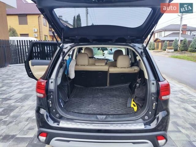 Чорний Міцубісі Аутлендер, об'ємом двигуна 2.36 л та пробігом 213 тис. км за 14500 $, фото 18 на Automoto.ua