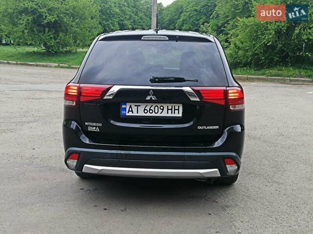 Чорний Міцубісі Аутлендер, об'ємом двигуна 2.4 л та пробігом 109 тис. км за 19999 $, фото 24 на Automoto.ua