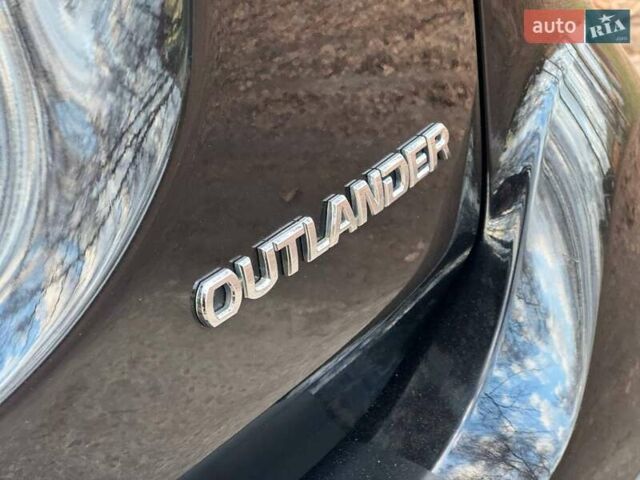Черный Мицубиси Аутлендер, объемом двигателя 3 л и пробегом 99 тыс. км за 15800 $, фото 19 на Automoto.ua