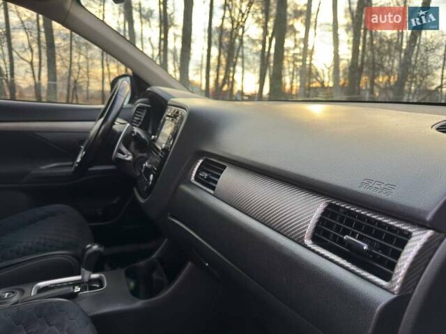 Черный Мицубиси Аутлендер, объемом двигателя 3 л и пробегом 99 тыс. км за 15800 $, фото 38 на Automoto.ua