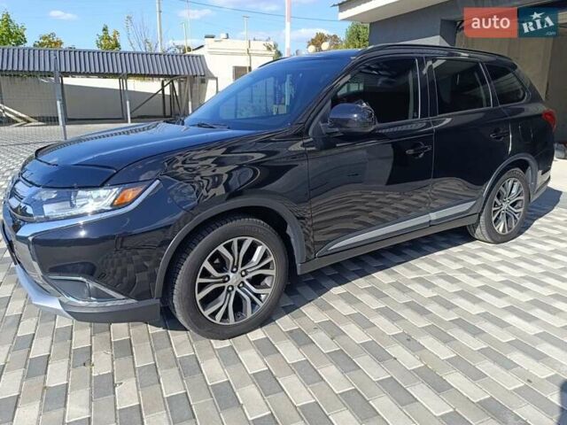 Черный Мицубиси Аутлендер, объемом двигателя 2.36 л и пробегом 120 тыс. км за 16900 $, фото 10 на Automoto.ua