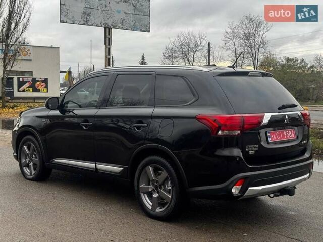 Черный Мицубиси Аутлендер, объемом двигателя 3 л и пробегом 99 тыс. км за 15980 $, фото 10 на Automoto.ua
