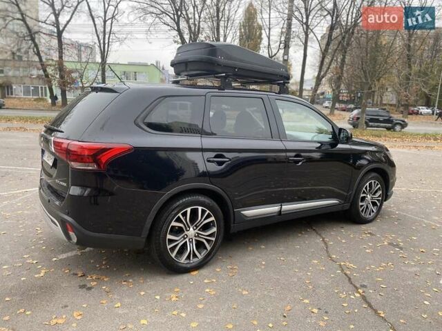 Чорний Міцубісі Аутлендер, об'ємом двигуна 2.36 л та пробігом 192 тис. км за 14200 $, фото 6 на Automoto.ua