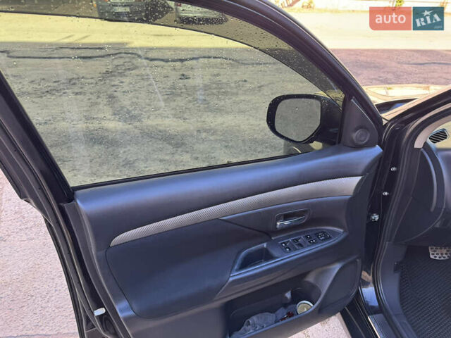 Черный Мицубиси Аутлендер, объемом двигателя 2.36 л и пробегом 108 тыс. км за 14600 $, фото 14 на Automoto.ua