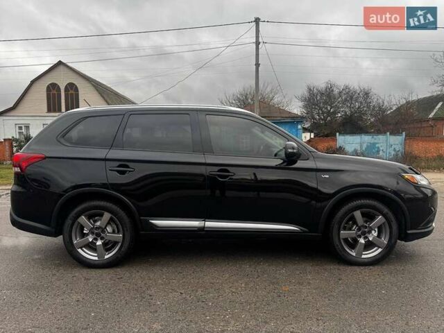 Черный Мицубиси Аутлендер, объемом двигателя 3 л и пробегом 99 тыс. км за 15980 $, фото 7 на Automoto.ua