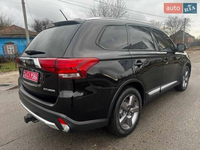 Черный Мицубиси Аутлендер, объемом двигателя 3 л и пробегом 99 тыс. км за 15980 $, фото 18 на Automoto.ua