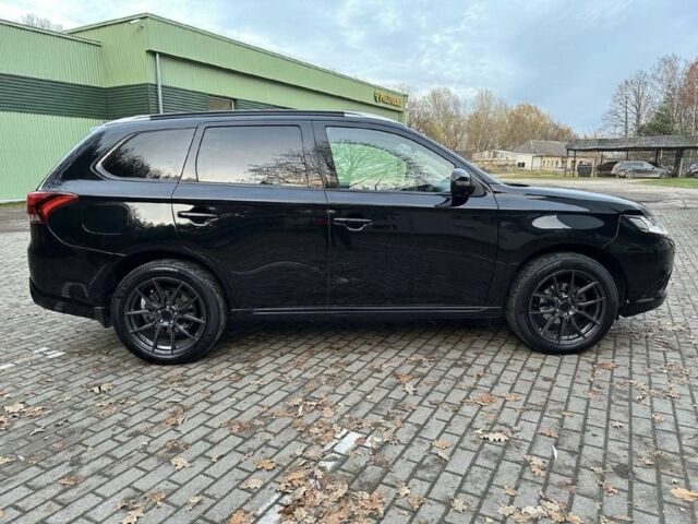 Чорний Міцубісі Аутлендер, об'ємом двигуна 0 л та пробігом 135 тис. км за 8600 $, фото 5 на Automoto.ua