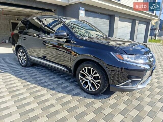 Черный Мицубиси Аутлендер, объемом двигателя 2.36 л и пробегом 120 тыс. км за 16900 $, фото 5 на Automoto.ua