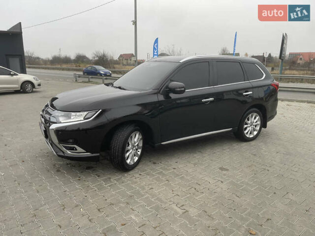 Чорний Міцубісі Аутлендер, об'ємом двигуна 2 л та пробігом 145 тис. км за 21200 $, фото 2 на Automoto.ua