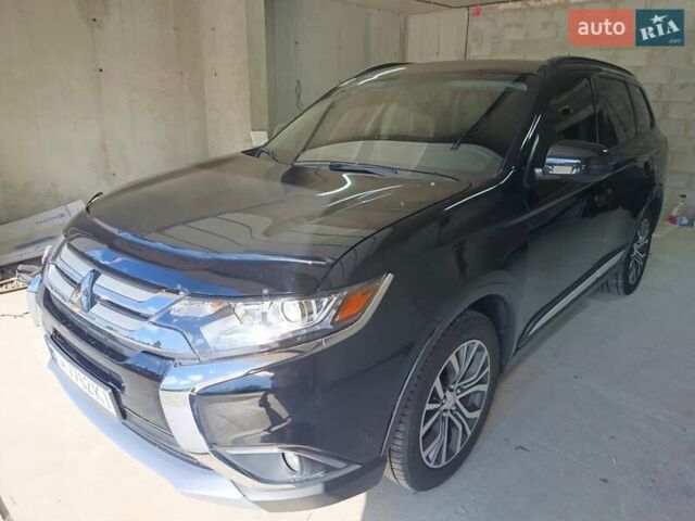 Черный Мицубиси Аутлендер, объемом двигателя 2.36 л и пробегом 120 тыс. км за 16900 $, фото 9 на Automoto.ua