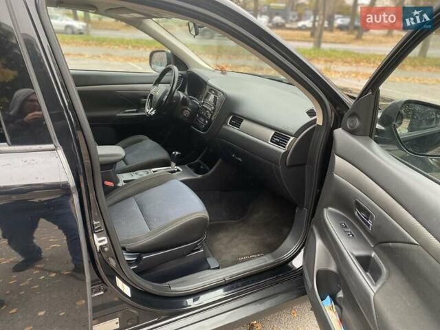 Чорний Міцубісі Аутлендер, об'ємом двигуна 2.36 л та пробігом 192 тис. км за 14200 $, фото 18 на Automoto.ua
