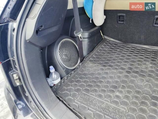 Чорний Міцубісі Аутлендер, об'ємом двигуна 2.36 л та пробігом 213 тис. км за 14500 $, фото 16 на Automoto.ua