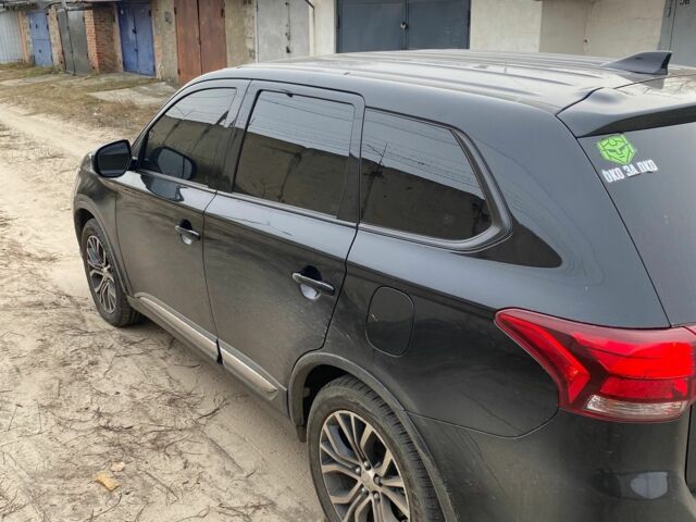 Черный Мицубиси Аутлендер, объемом двигателя 2.4 л и пробегом 185 тыс. км за 14300 $, фото 7 на Automoto.ua