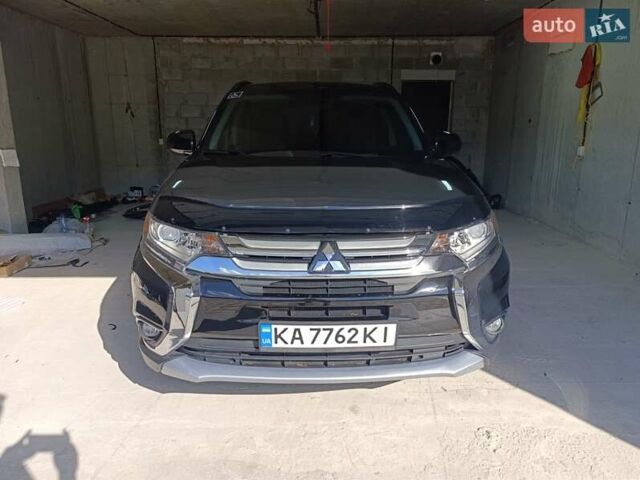 Черный Мицубиси Аутлендер, объемом двигателя 2.36 л и пробегом 120 тыс. км за 16900 $, фото 11 на Automoto.ua