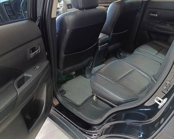 Черный Мицубиси Аутлендер, объемом двигателя 2.36 л и пробегом 120 тыс. км за 16900 $, фото 35 на Automoto.ua