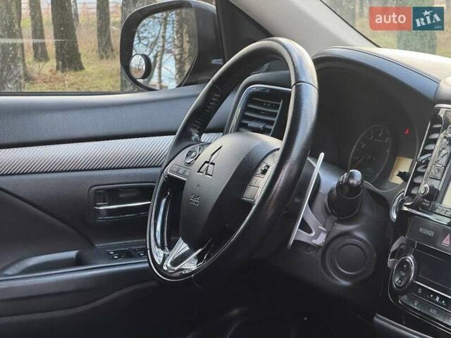 Черный Мицубиси Аутлендер, объемом двигателя 3 л и пробегом 99 тыс. км за 15800 $, фото 39 на Automoto.ua
