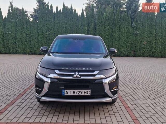 Черный Мицубиси Аутлендер, объемом двигателя 2.36 л и пробегом 168 тыс. км за 14999 $, фото 4 на Automoto.ua